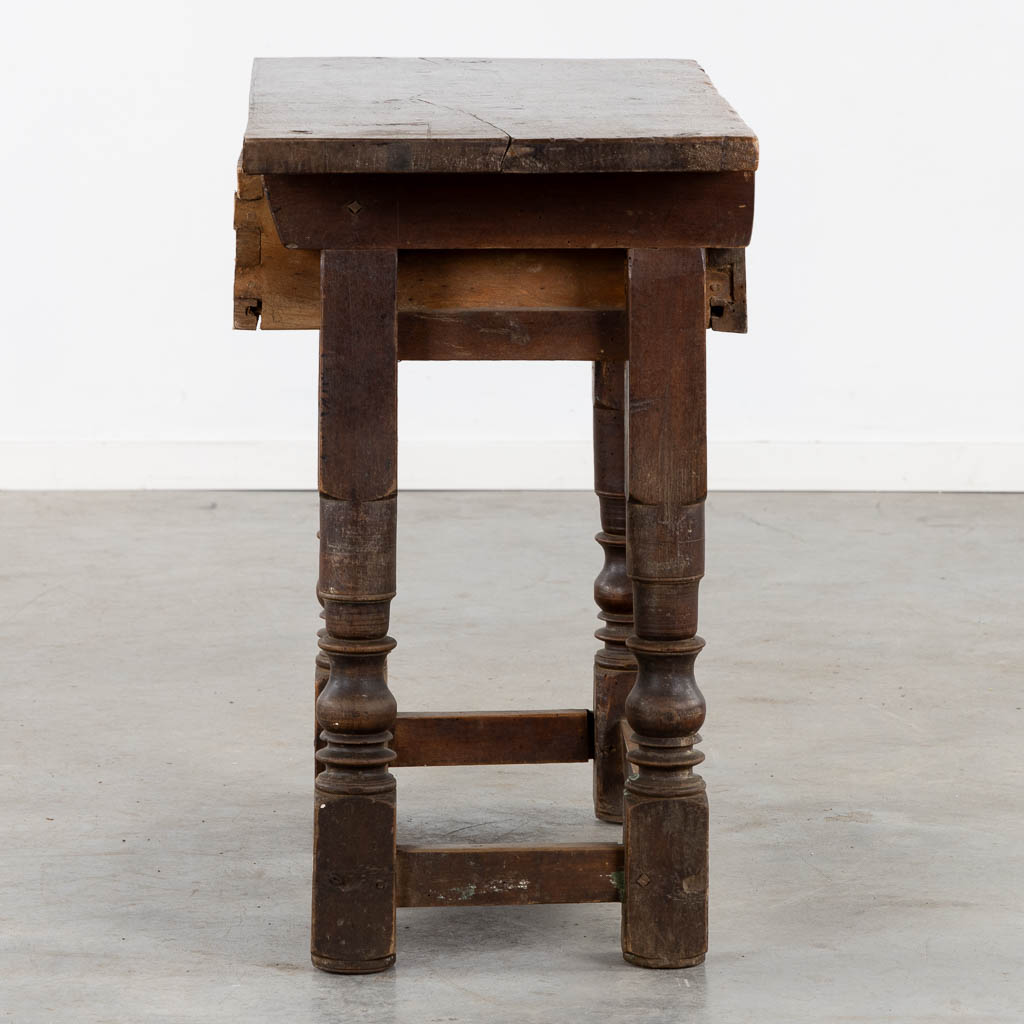 An antique side table, sculptured wood. (L:46 x W:97 x H:76 cm)
