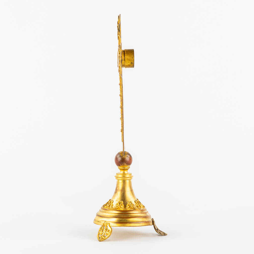 A small reliquary crucifix with a relic of the 