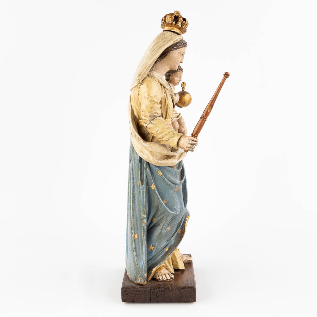 An antique wood-sculptured and polychrome statue of Madonna with child. Circa 1900-1920. (L: 11 x W: 20 x H: 46 cm)