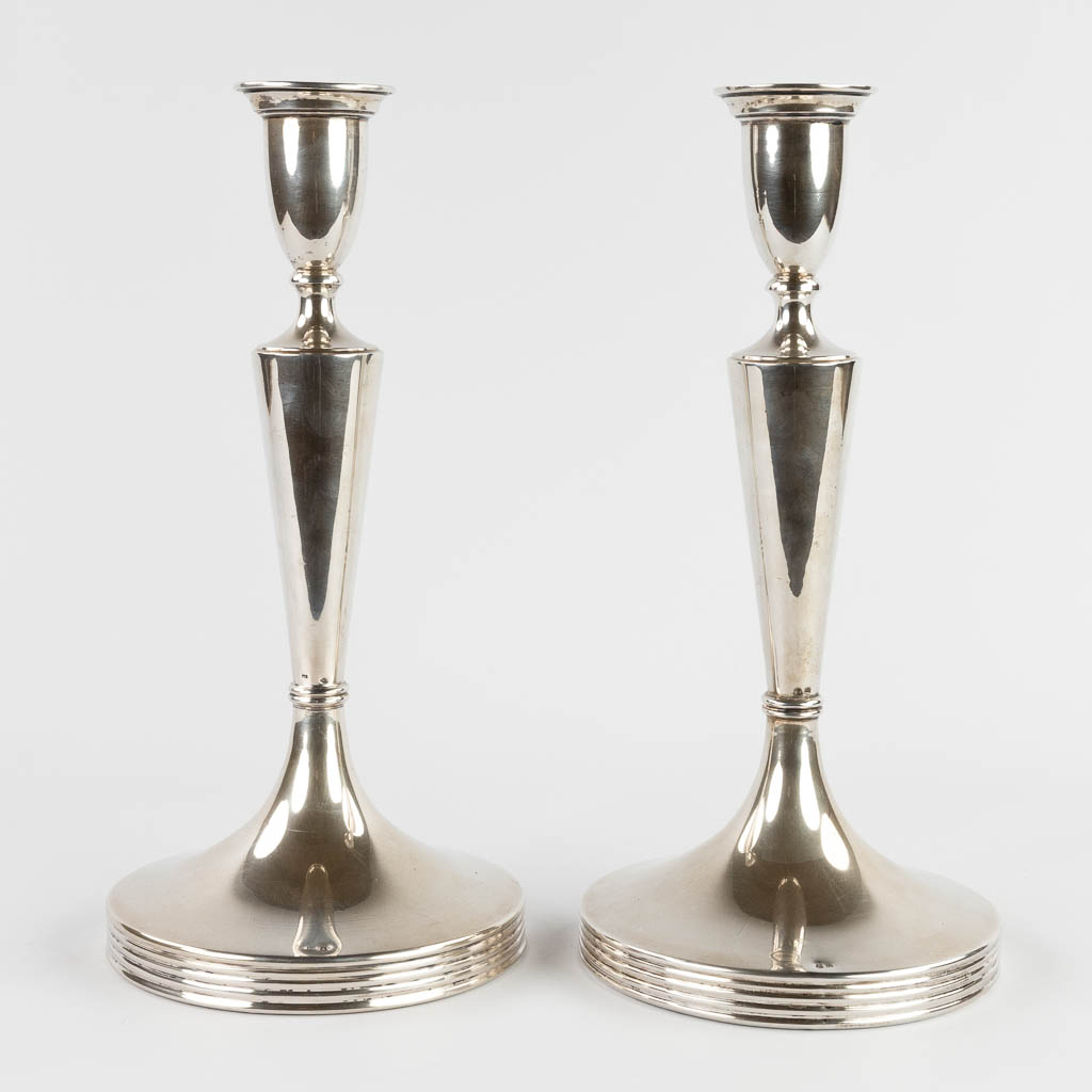 A pair of candle holders, silver, 800/1000, marked Vienna, Austria. 1872-1922. 1152g. (W:16,5 x H:34 cm)