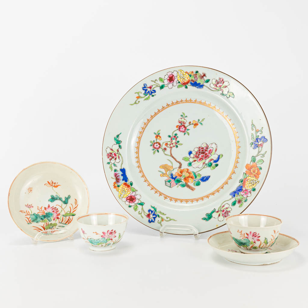 A plate, two cups, and saucers made of Chinese porcelain. 19th century. 