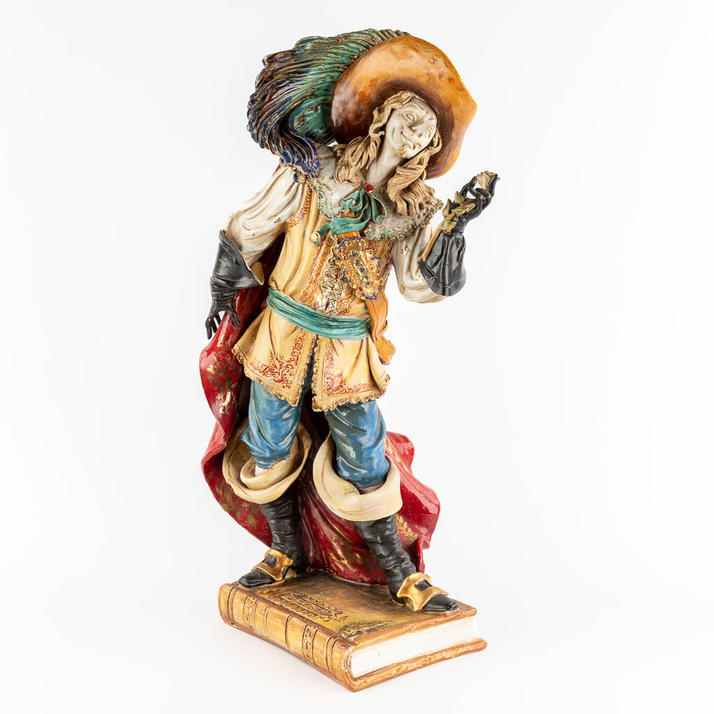A large polychrome terracotta figurine of Cyrano De Bergerac. 20th C. (D:31 x W:35 x H:65 cm)