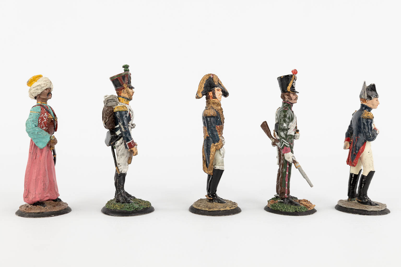 Napoleon and the army of Napoleon Bonaparte, a collection of 9 tin figurines. (H: 8 cm)