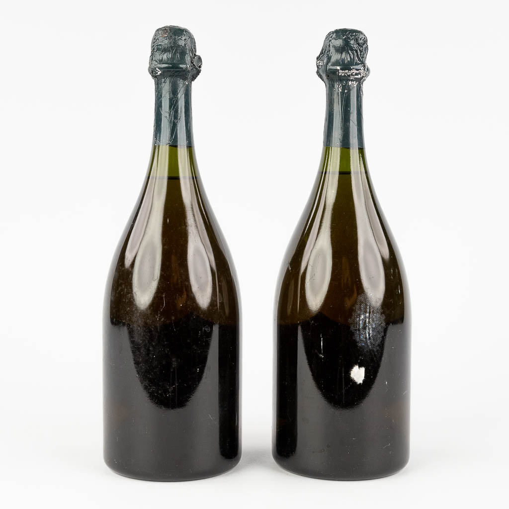 Dom Pérignom, a pair of Champagne bottles, 1964. 