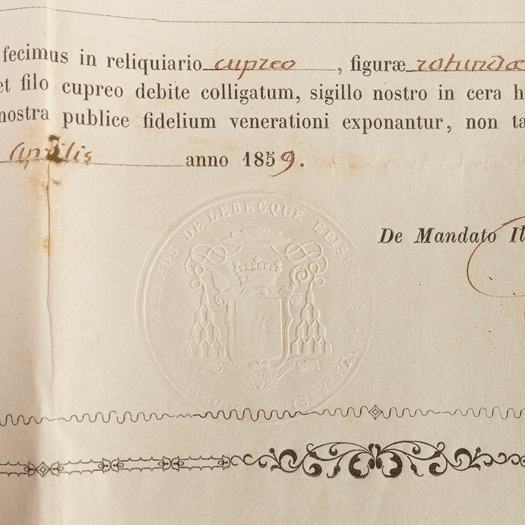 A sealed theca with a relic: Ex Ossibus Sancti Laudati Martyris