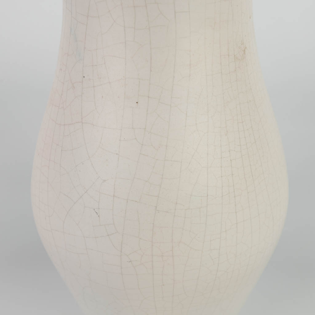 A vase with flower decor and marked Flora Gouda Holland Rimini. (H:27cm)