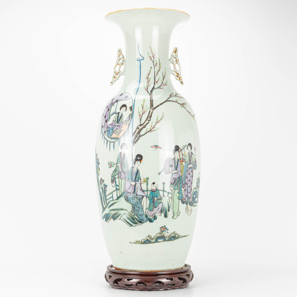 A vase made of Chinese porcelain and decorated with ladies and branches