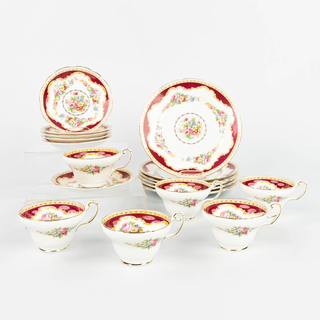 A 6-person coffee service with matching saucers and plates marked Foley China Windsor. 