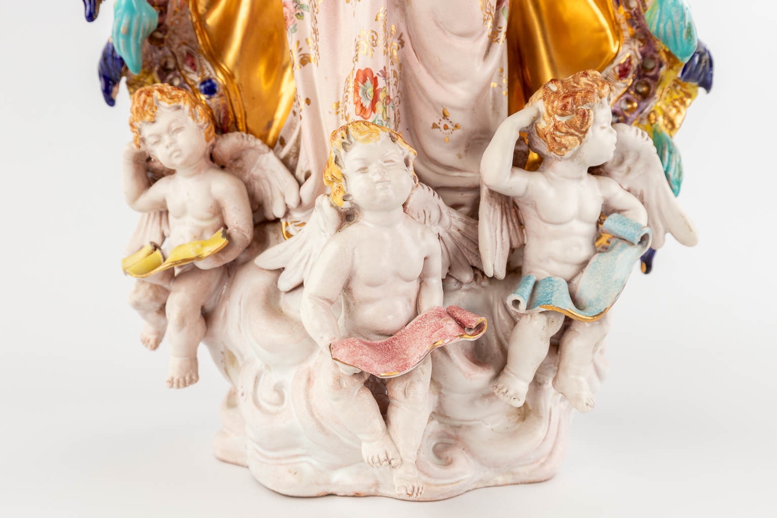 Paolo MARIONI (XX) A large polychrome terracotta figurine of Madonna with children, 20th C. (D:18 x W:31 x H:65 cm)