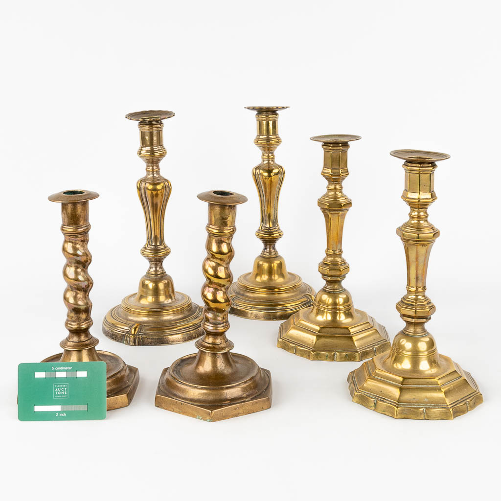 A collection of 3 pairs of candlesticks, 19th Century. (H: 27 cm)