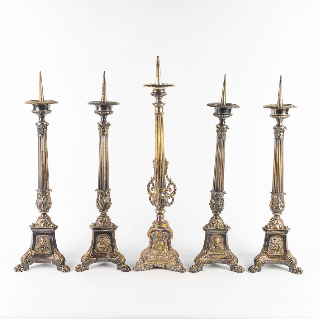 A collection of 5 church candlesticks made of silver-plated metal and holy figurines. (H:76cm)