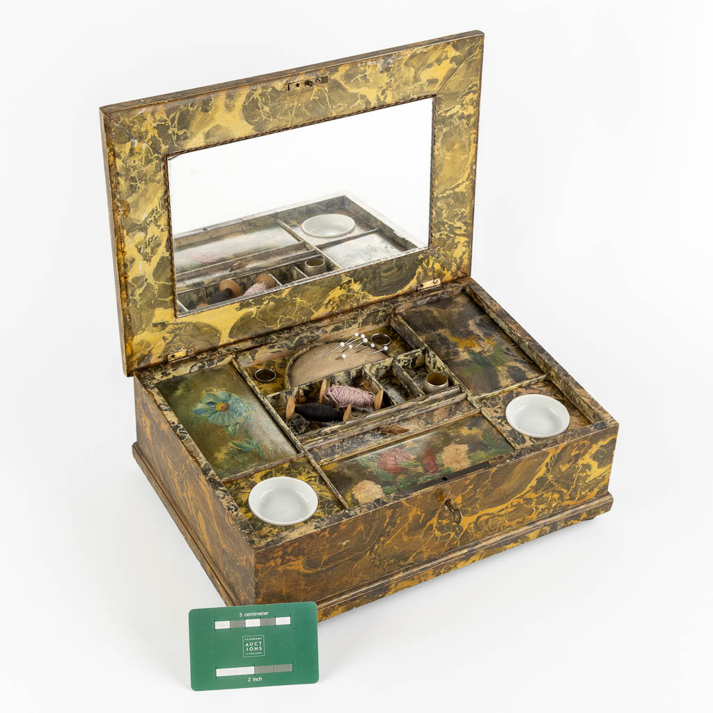 A sewing box with a small painting and accessories. (L:22 x W:30 x H:12 cm)