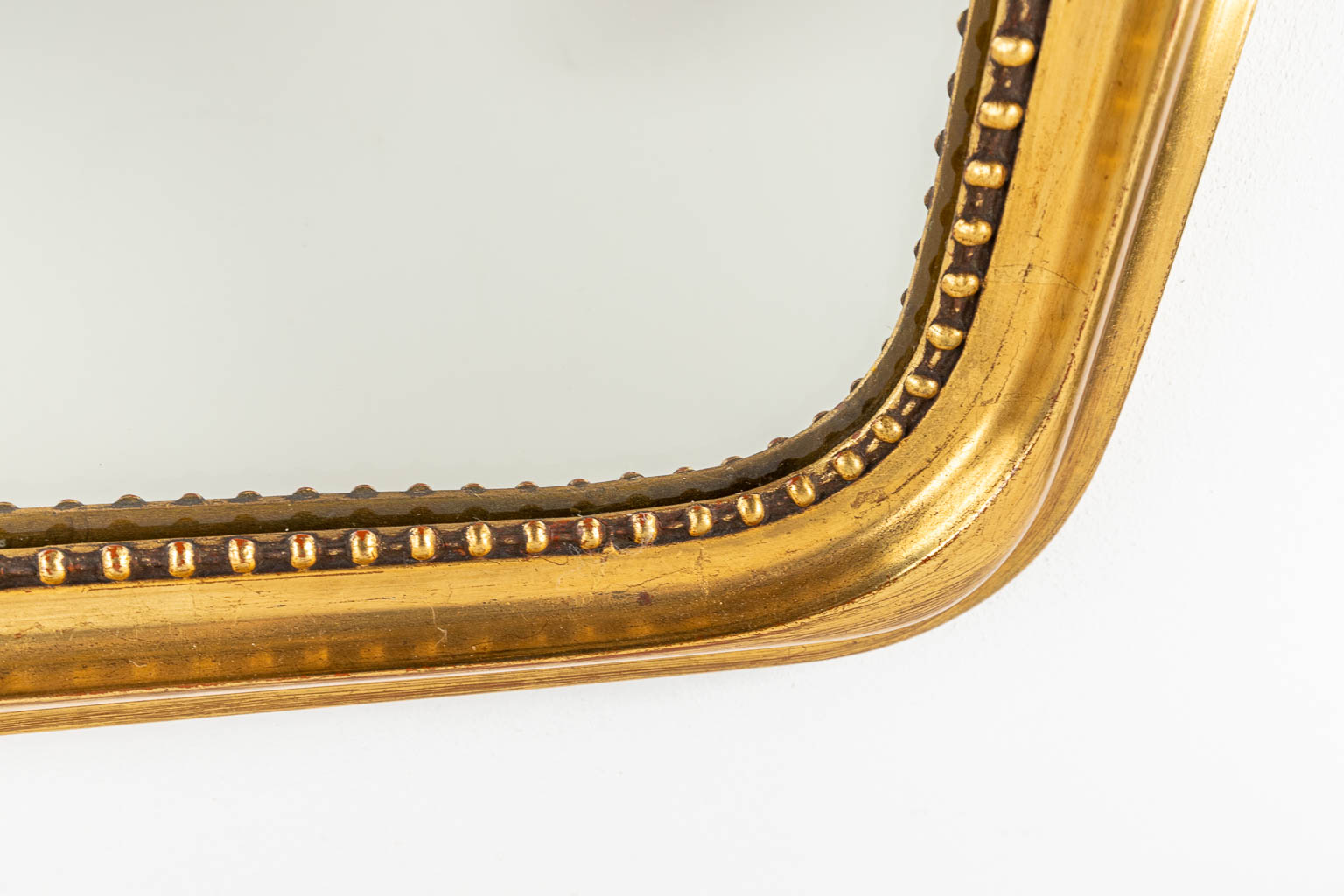 A mirror in Louis XV style, gilt wood and stucco. (H:105cm)