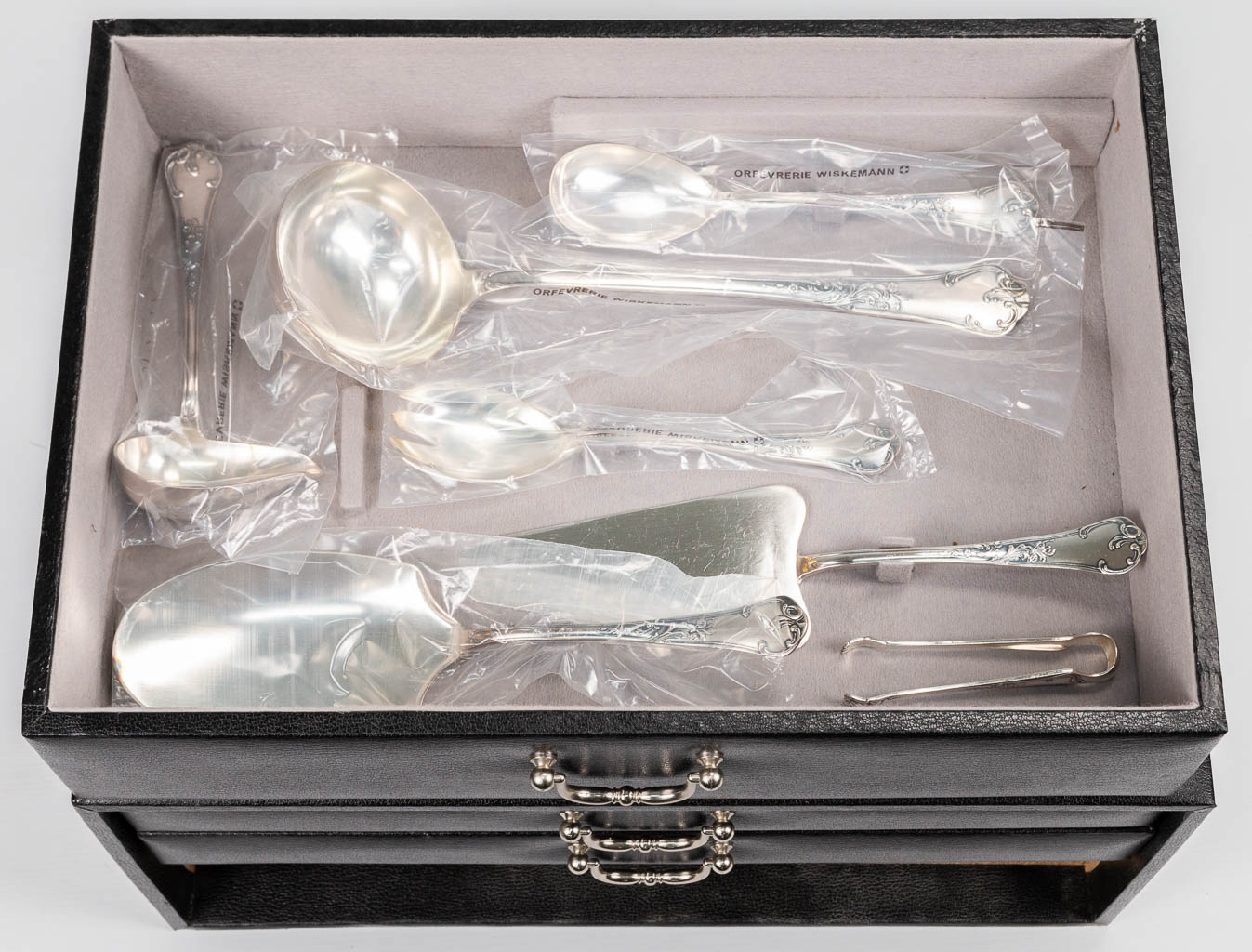 A collection of 2 silver plated cutlery sets of which 1 is marked Wiskemann, model 