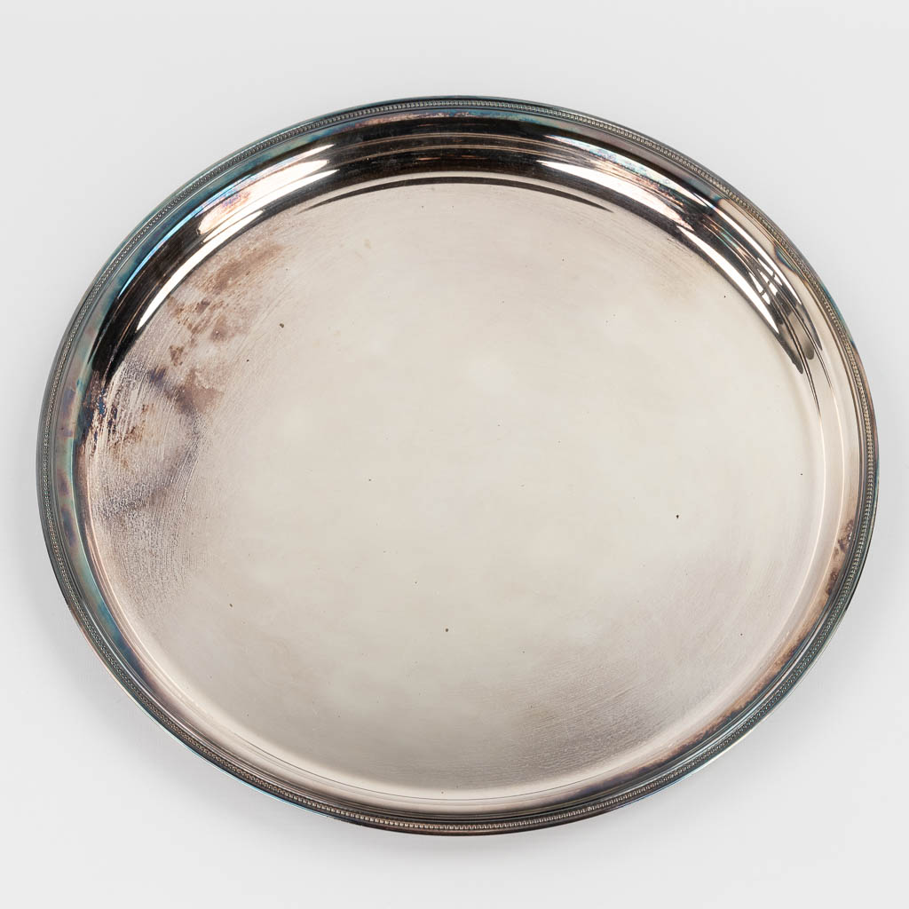 Christofle, a Chocolatière, sugar pot and milk jug on a serving tray. Silver-plated metal. (H:26 x D:39 cm)