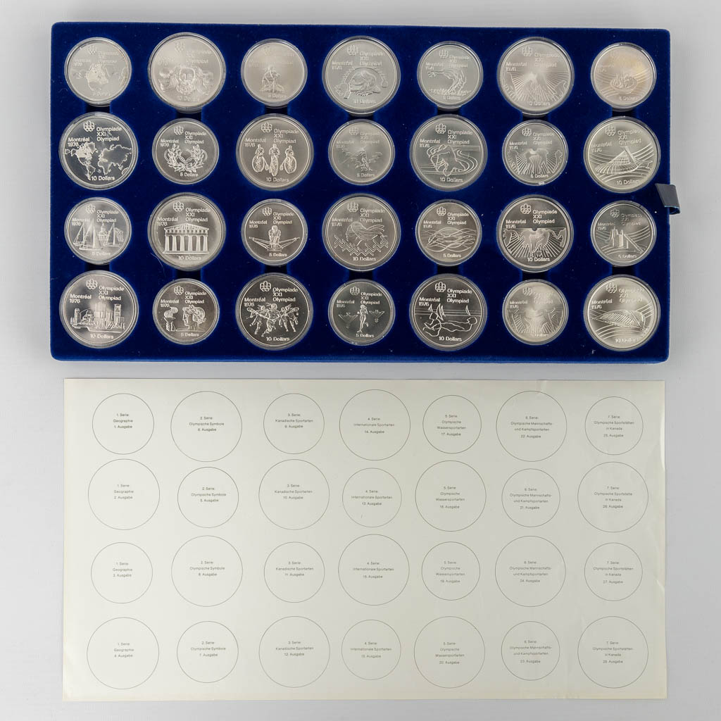 Canadian Olympic Silver Coins 1976, for the Olympic games in Montreal. +/- 1 kg. (D:23 x W:40 x H:4 cm)