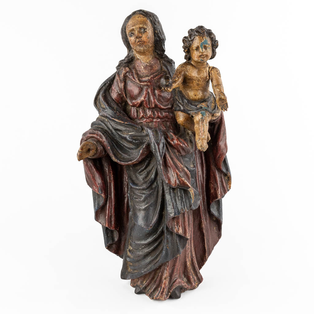 An antique figurine of Madonna with child, polychrome. 17th/18th C. (W:24 x H:46 cm)