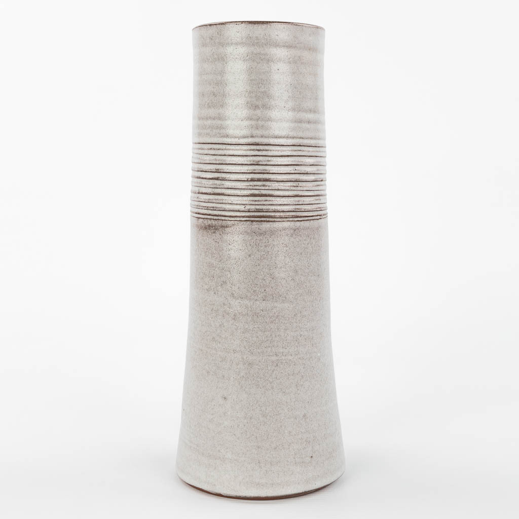 A mid-century vase made of white-glazed ceramics and marked Sanchez. (H:27cm)