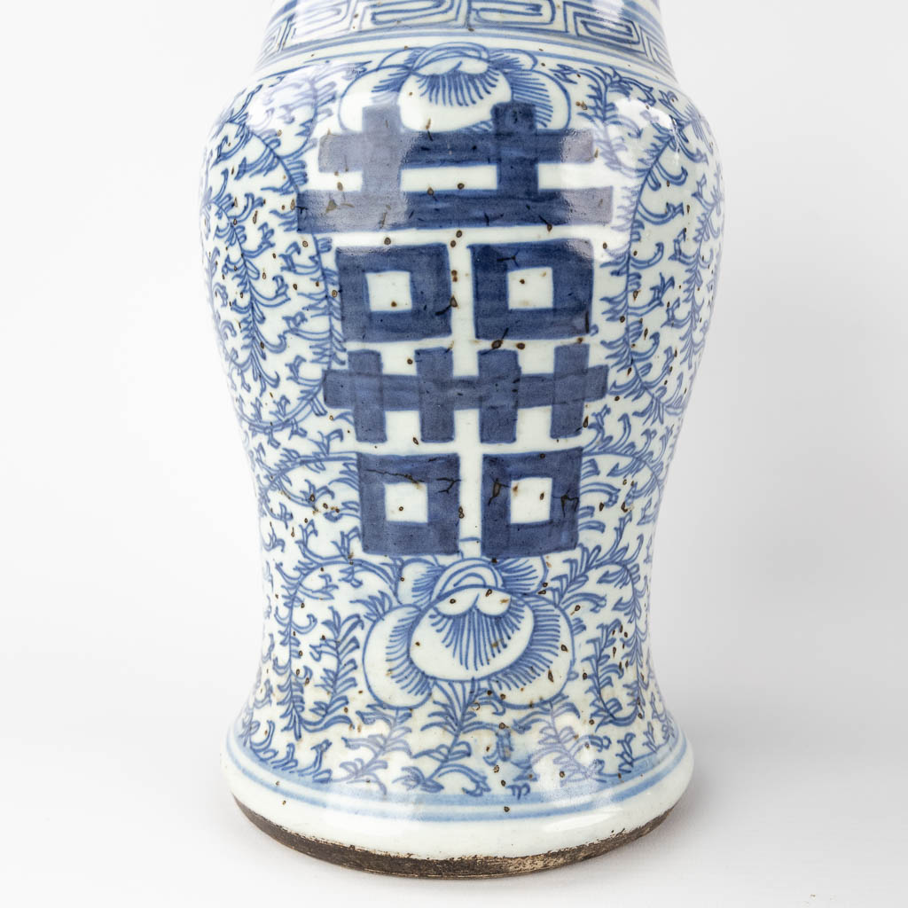 Three Chinese vases with a blue-white decor and Celadon. 19th/20th C. (H:43 x D:19 cm)