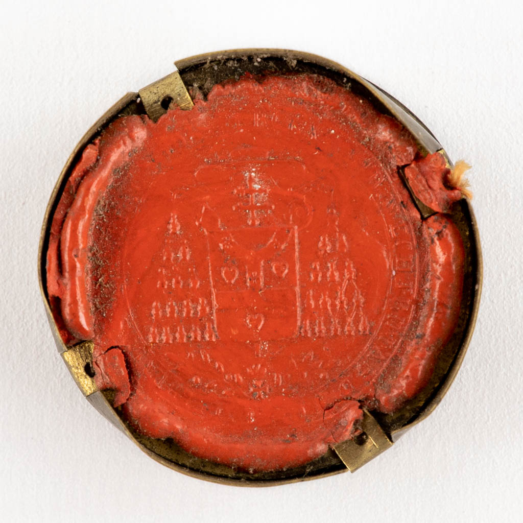 Three sealed theca with relics for Joannis Babtist, Barbara V.M., Dympnae Virg. (H:1,1 x D:4 cm)