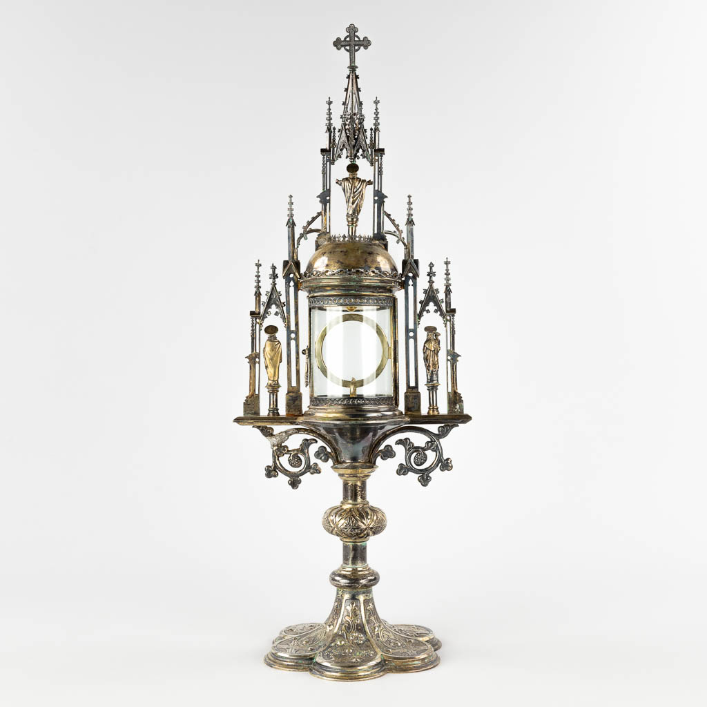 A large tower monstrance, silver-plated brass in a Gothic Revival style. 19th C. (D:17,5 x W:22 x H:59 cm)