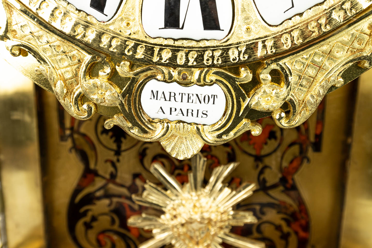 A Kartell clock finished with boulle inlay and mounted with bronze. Signed Martenot à Paris. (H:85cm)