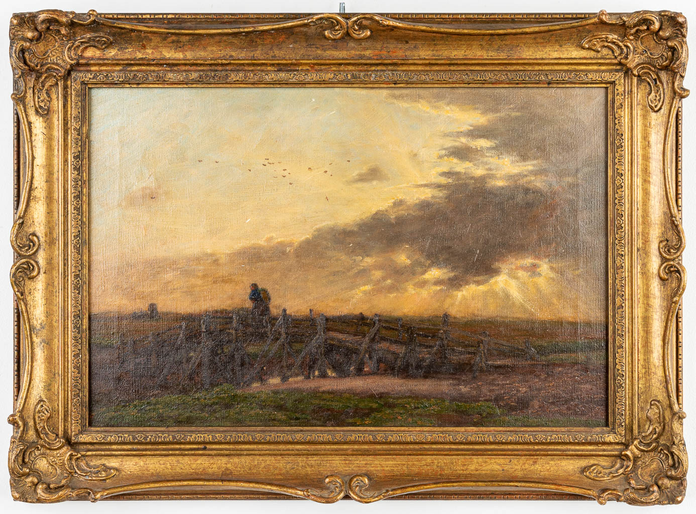 Jacob Henricus MARIS (1837-1899)(attr.) een landschap met figuur bij ondergaande zon, olie op doek. (54 x 36 cm)