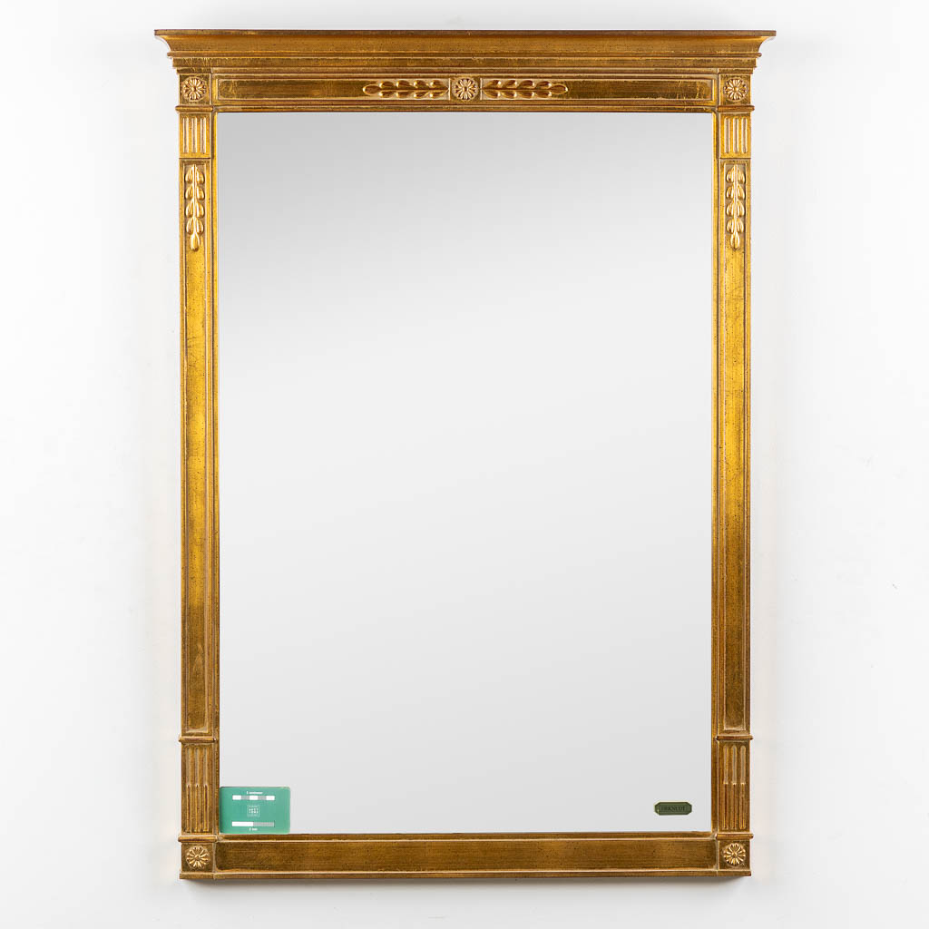Deknudt, een spiegel. Verguld hout in Empire stijl. (W:74 x H:102 cm)
