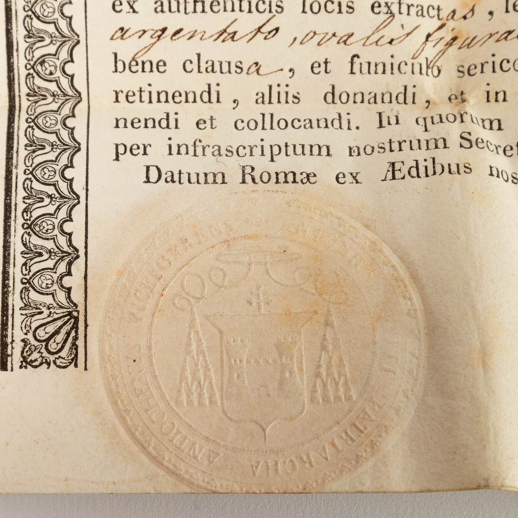 A sealed theca with a relic: Ex Ossibus Sancti Sebastiani Martyris