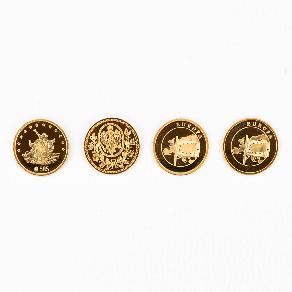 Een collectie van 4 munten, ECU, 14 karaat goud (585)