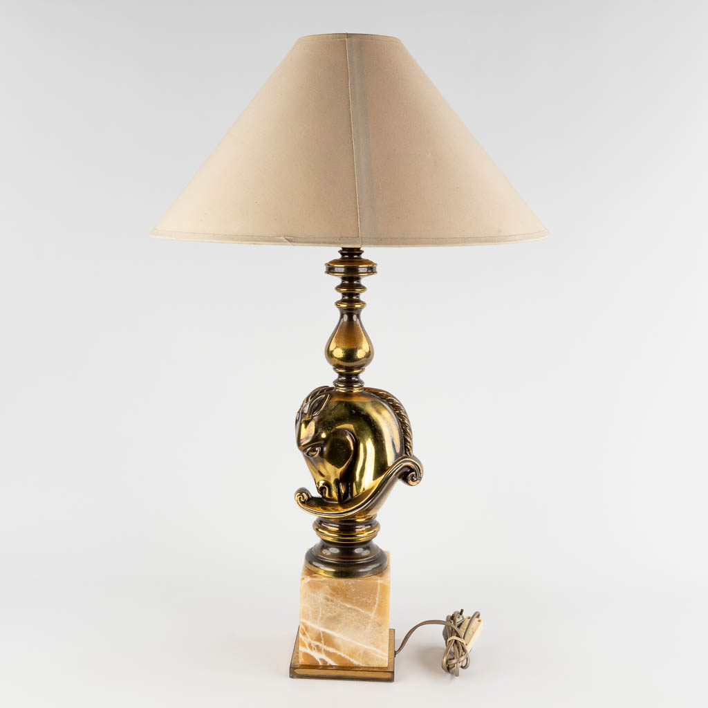 Deknudt, A table lamp with horse head, bronze on onyx. (D:14 x W:18 x H:60 cm)