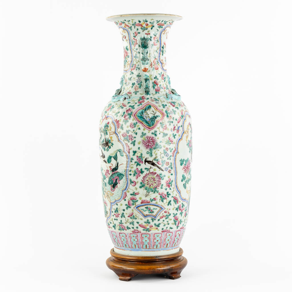 A Chinese Famille Rose vase decorated with fauna and flora. (H:60 x D:24 cm)