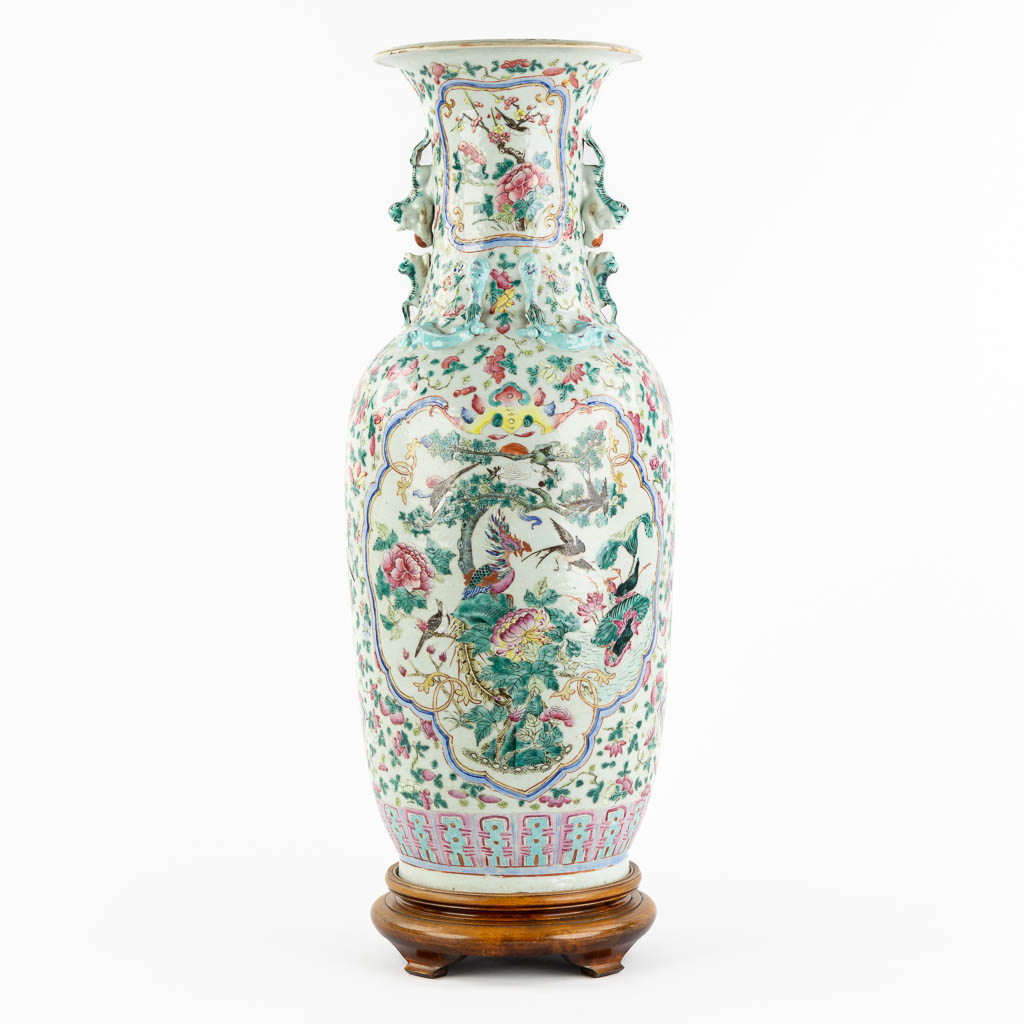 A Chinese Famille Rose vase decorated with fauna and flora. (H:60 x D:24 cm)
