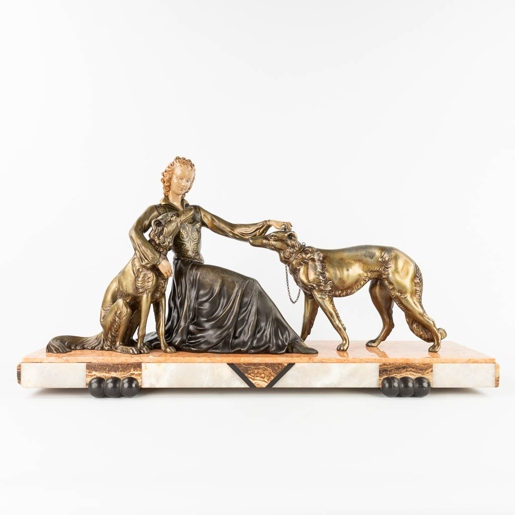  Ferdinand PREISS (1882-1943) "Lady with greyhounds' a statue made in art deco style. (L:21 x W:78 x H:41 cm)