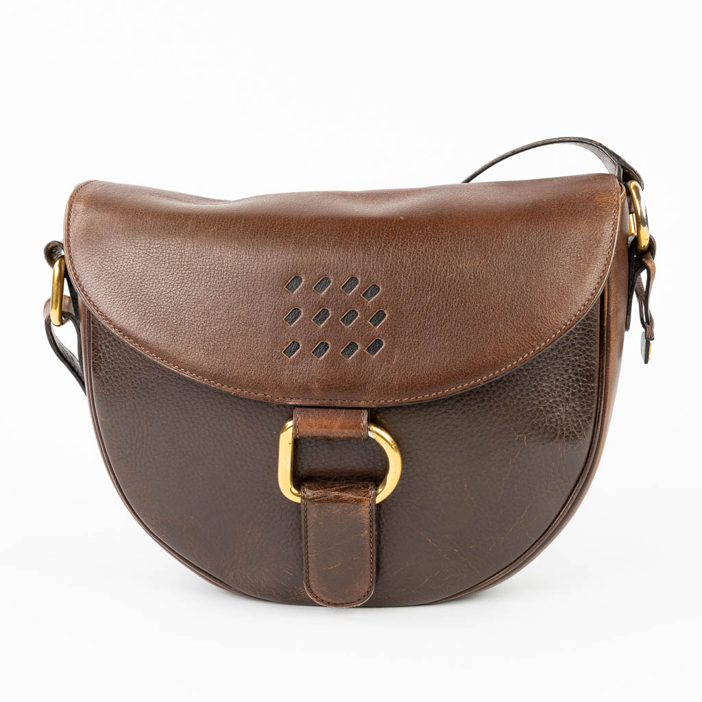 Delvaux, een handtas gemaakt uit bruin leder met vergulde elementen. (W:28 x H:23 cm)