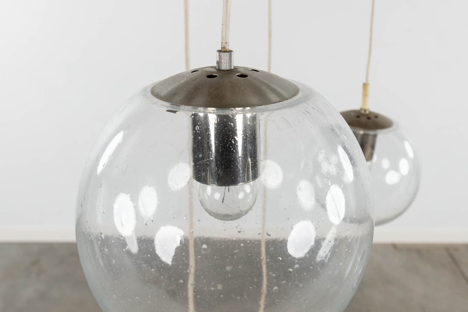Raak, Amsterdam, a large ceiling lamp with 10 glass balls. 20th C. (D:70 cm)