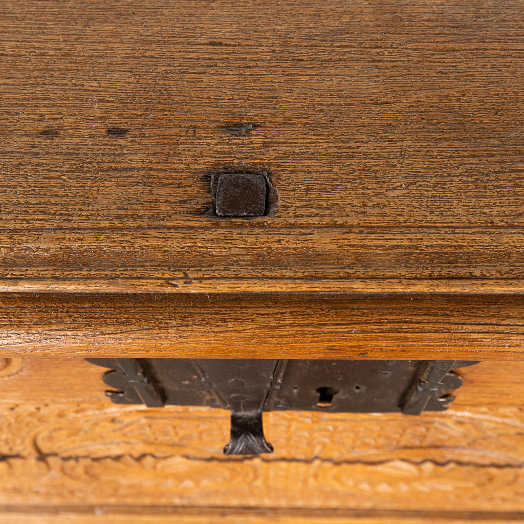 An antique chest with wood-sculptured panels. 19th C. (D:66 x W:120 x H:73 cm)
