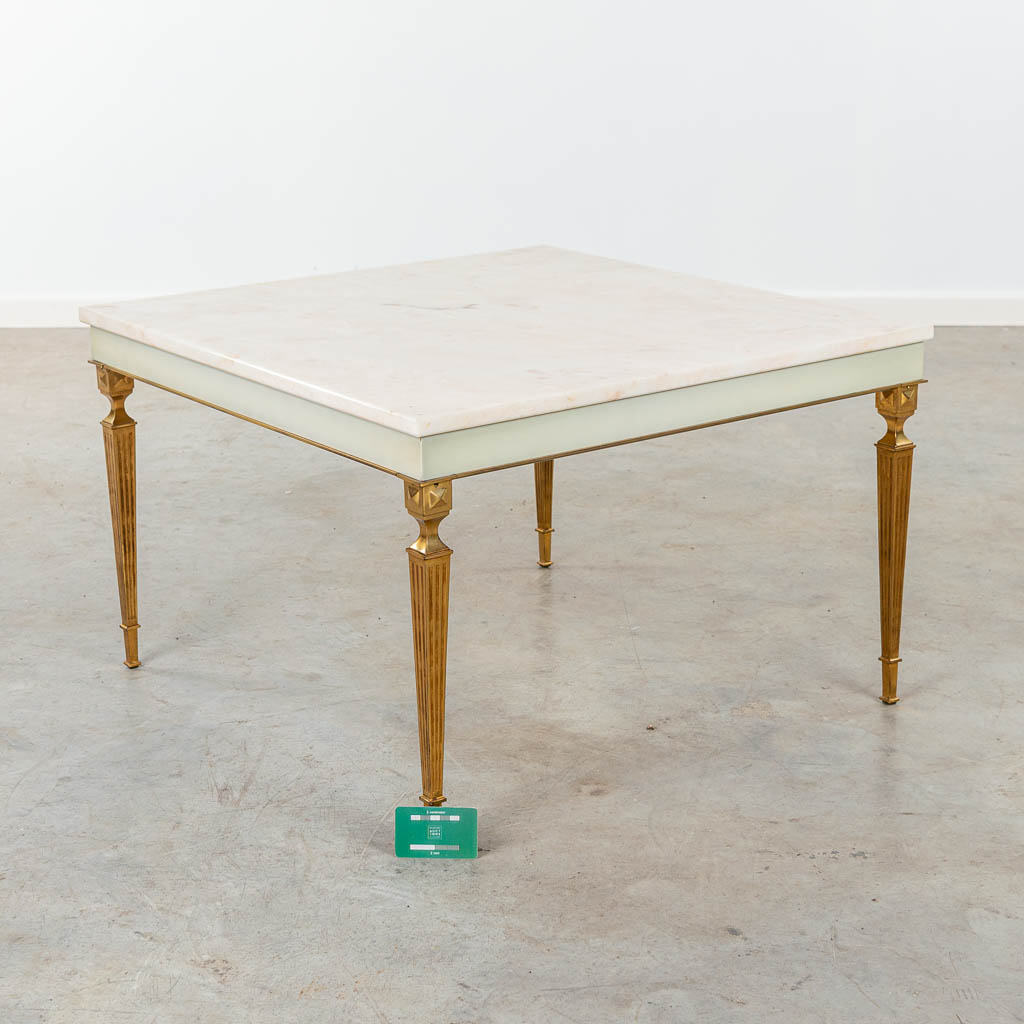A coffee table made in Hollywood Regency style, brass and marble. (H:48cm)