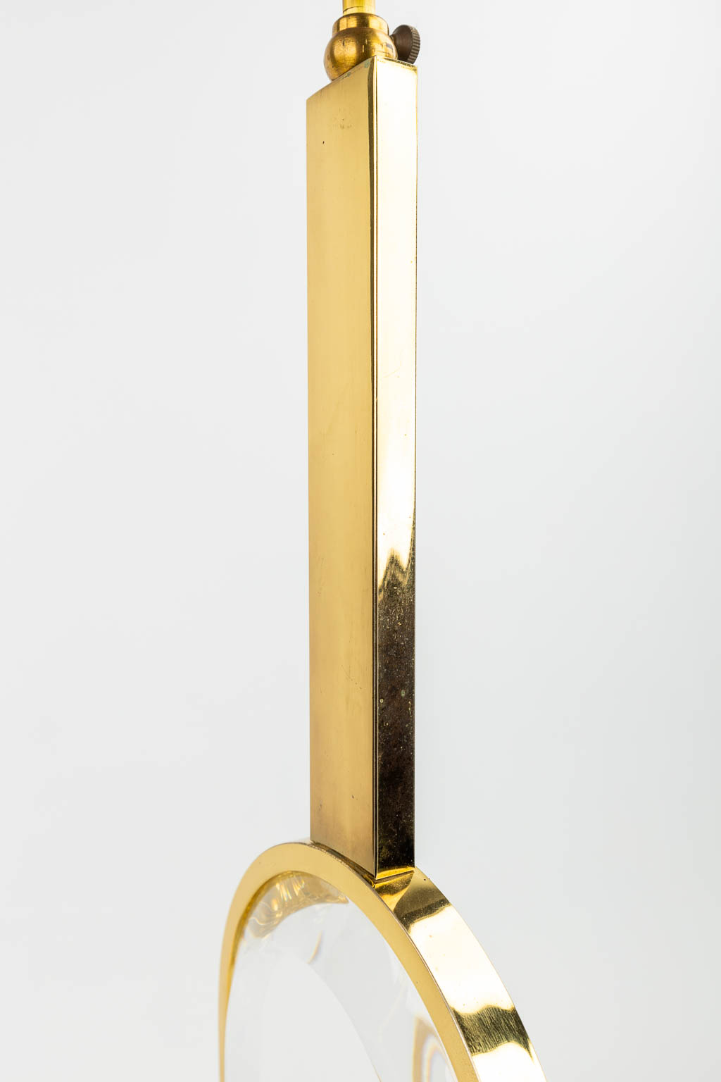 A pair of mid-century table lamps made of gold-plated metal and acrylic. (H:84cm)