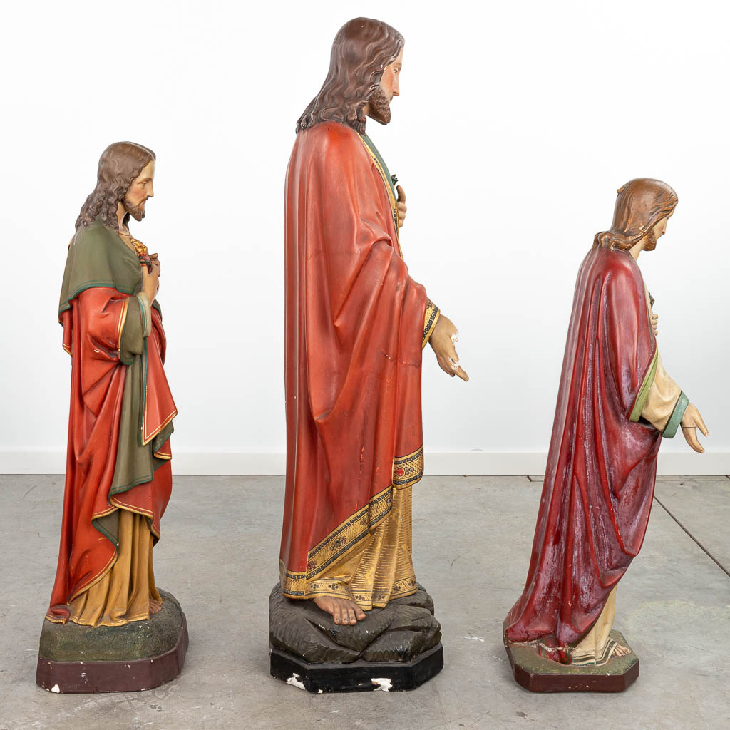A collection of 3 large polychrome plaster statues of Jesus 