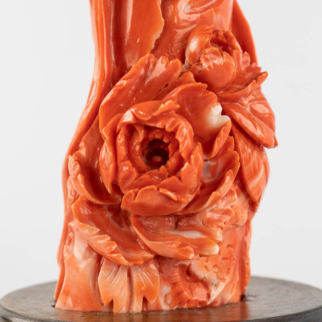 A finely sculptured red coral, image of an elegant lady. 19th C. 395g. (H:19,5 cm)