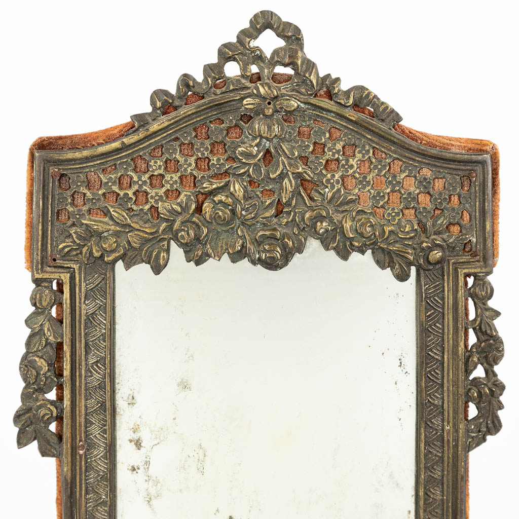 A decorative table mirror made with silver, and marked M.S. 800. (H:24cm)