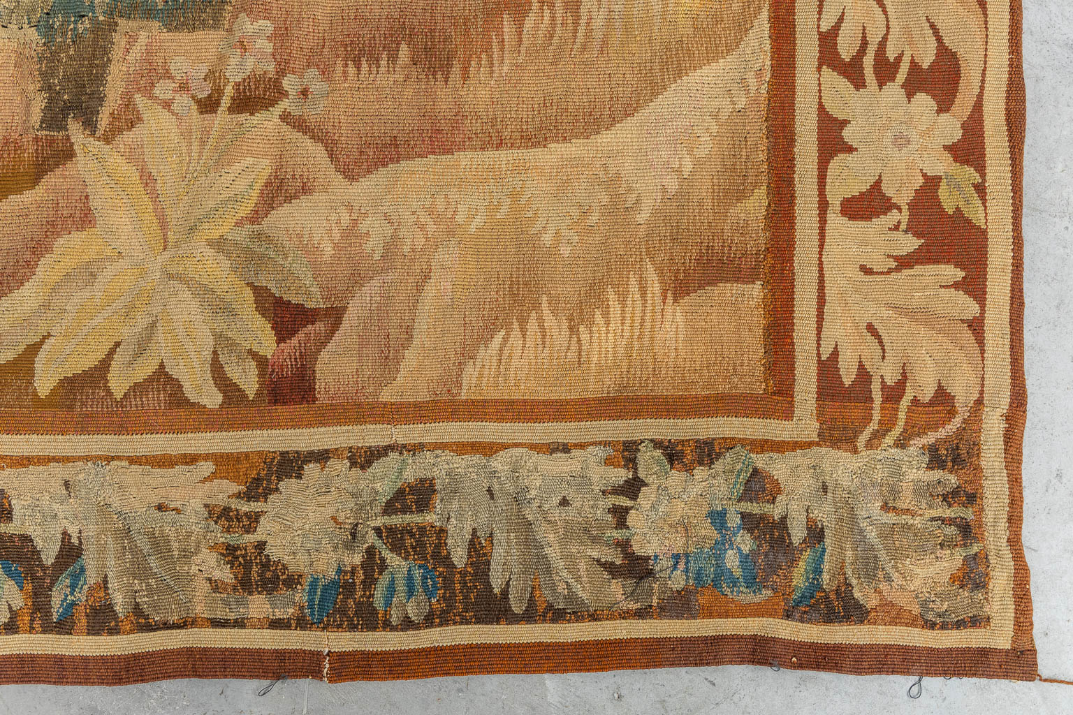 An antique Tapissery, decorated with fauna and flora. 17th C. (L:400 x W:260 cm)