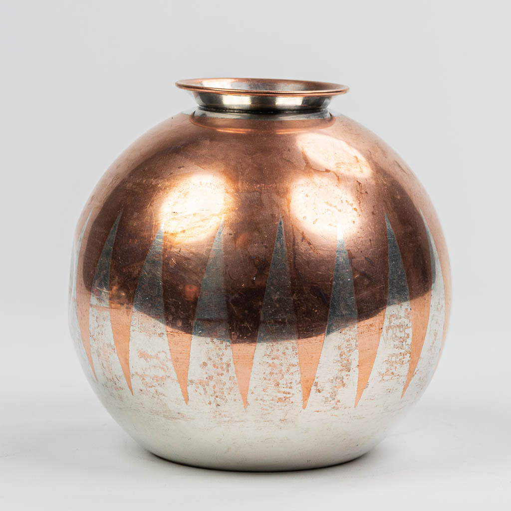 A Chirstofle Dinanderie vase, made of silver-plated copper in art deco style. 