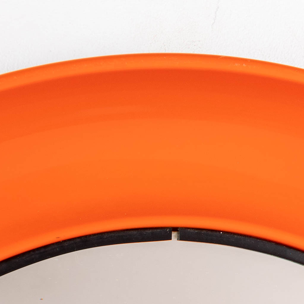 Two mid-century mirrors with an orange acrylic rim. Made in Denmark. (D:56 cm)