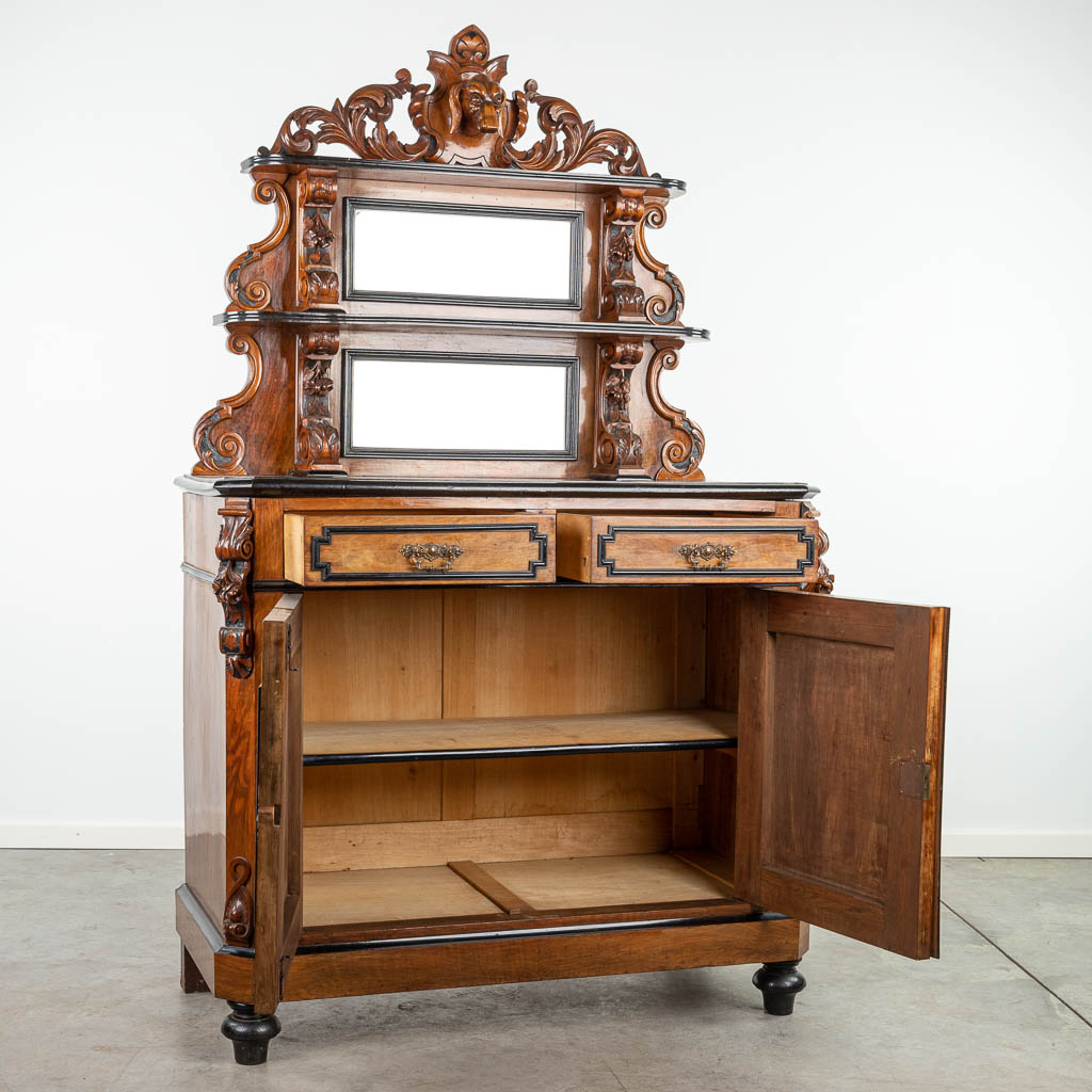 A cabinet with mirror 