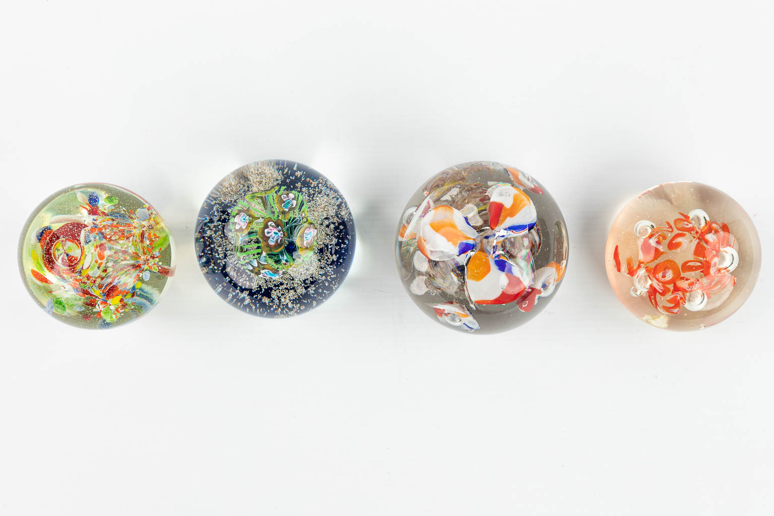 A collection of 8 paperweights made of glass in Murano, Italy. (H:8cm)
