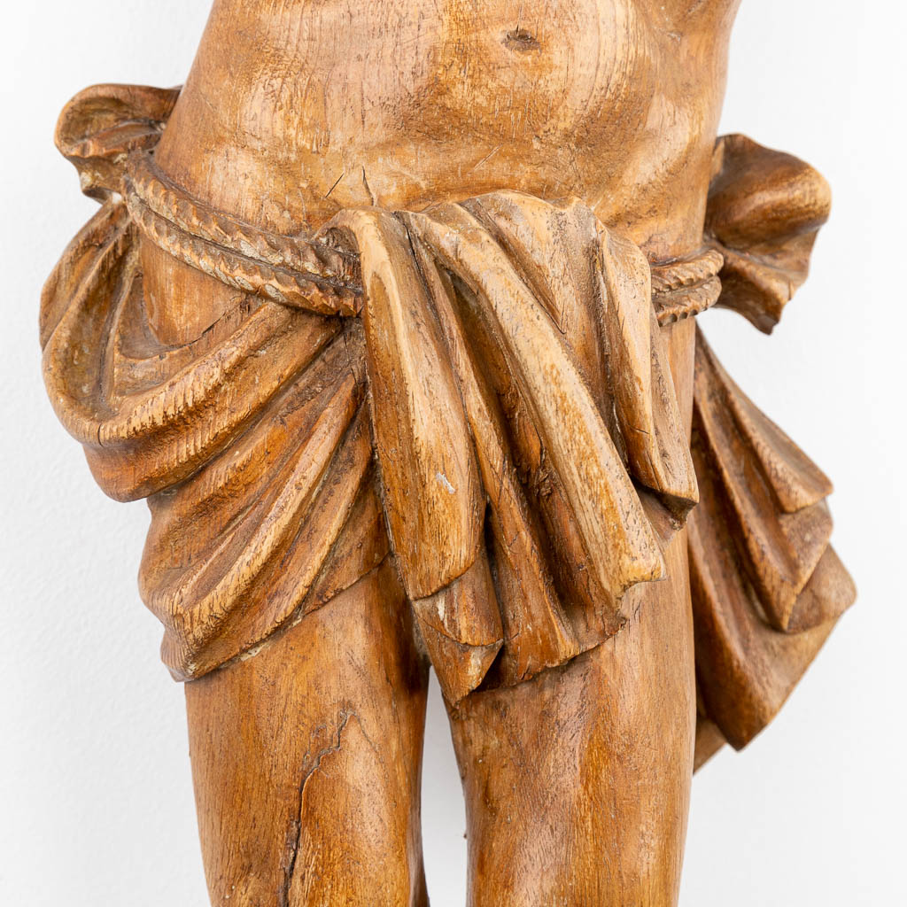 An antique and large wood sculptured Corpus Christi, around 1900. (H:90cm)