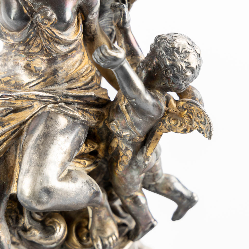 WMF, A large silver-plated candelabra, with an image of Cupid. (L:37 x W:37 x H:57 cm)