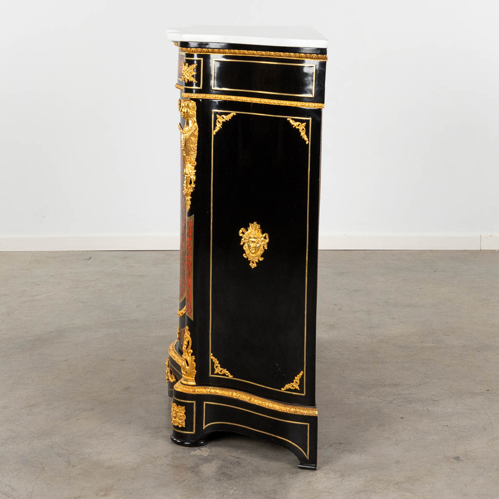 A Boulle cabinet with bow front, Tortoise shell and copper inlay, Napoleon 3, 19th C. (D:42 x W:114,5 x H:106 cm)